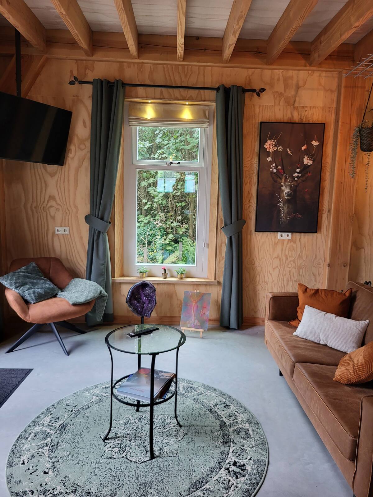 Plywood Lodge interior — welcoming living room